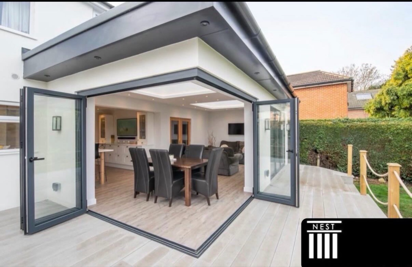 Home extension with bifold doors for indoor-outdoor living